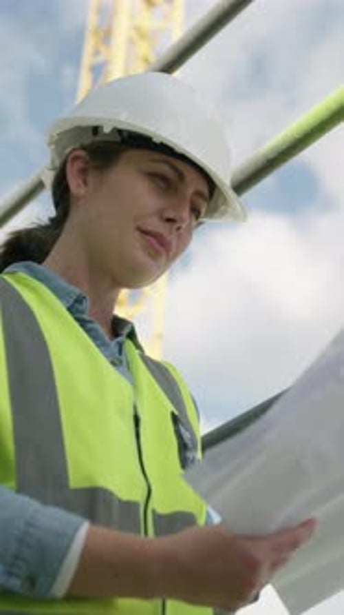 Blueprint, woman and civil engineer on site for planning infrastructure, maintenance or repairs