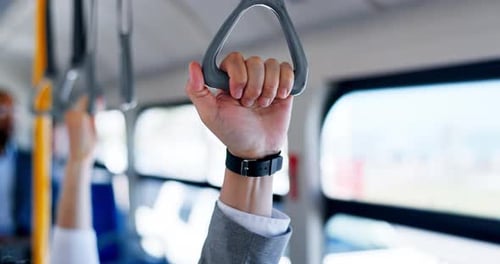 Person, hands and rail with handle on bus for public safety, transport or security on vehicle