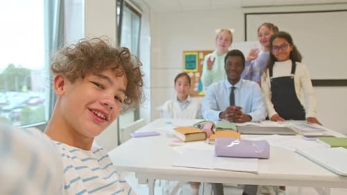 Teen Takes Selfie with Classmates and Teacher