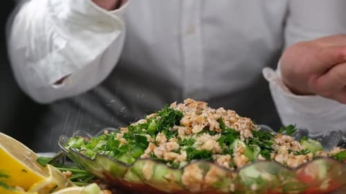 Chef Sprinkling Salt