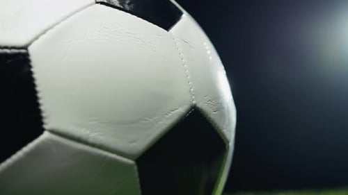 Extreme Close-up of Soccer Ball at Night