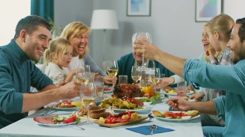 Family Celebration Meal with a Toast and Laughter