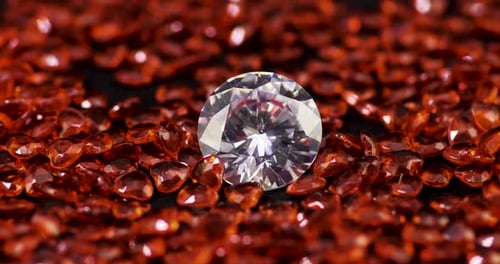 Sparkling Diamond Surrounded by Red Heart Gems