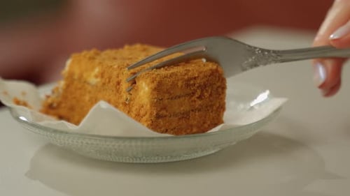 Close Up of Piece of Cake Being Cut