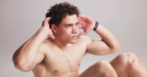 Man, sit up and fitness in studio with exercise for abs, development and wellness on white