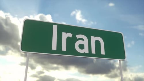 Welcome to Iran road sign on blue sky with clouds