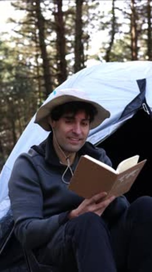 vertical portrait Forest Tranquility: Camper's Reading Retreat at summer
