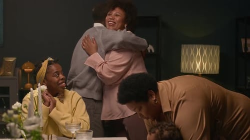 Happy Black People Greeting while Gathering around Table at Family Dinner