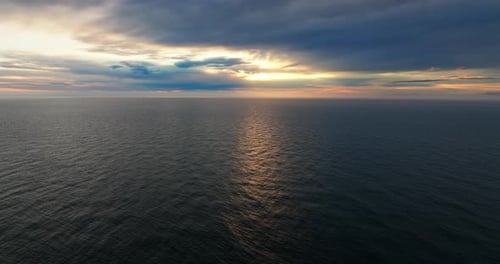 Peaceful Sunset Reflections On Ocean Waters