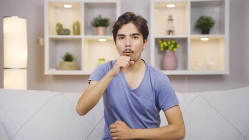 Sick man coughing.