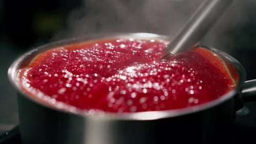 Red Sauce Cooking and Bubbling in Saucepan