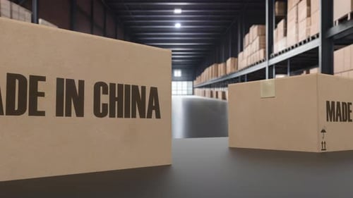 Boxes with MADE IN CHINA Text on Conveyor