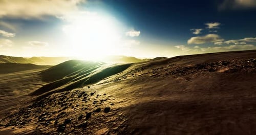 Realistic Panning Shot Over Desert Landscape at Sunrise