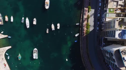 Aerial Top Down of Sliema Waterfront Boats and Apartments Malta