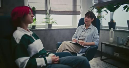 Female Psychotherapist Provides Psychological Support During Therapy Session