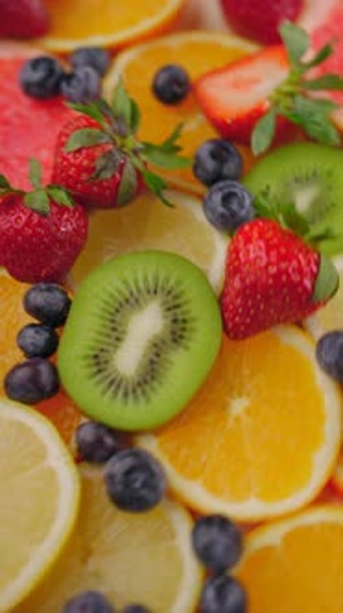 Vibrant Display of Strawberries, Blueberries, and Citrus
