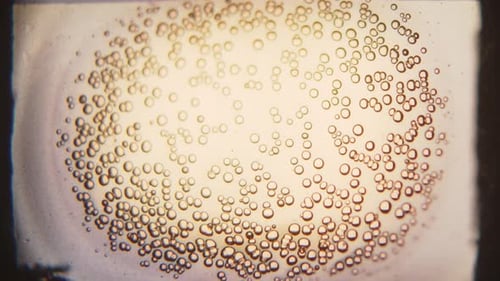 Burning 8mm Film Showing Tiny Bubbles In Close-up Detail