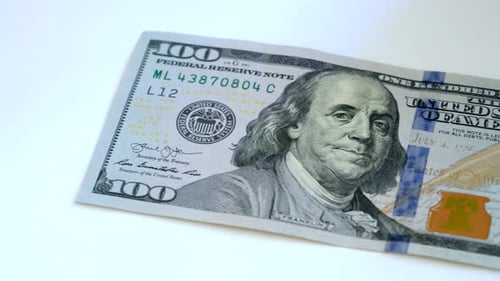 One hundred dollars bill closeup view