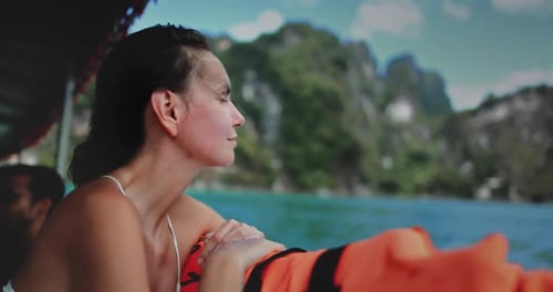 Caucasian Tourist Female on Boat Tour in Thailand