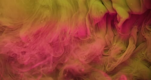Colorful Paints Swirls Abstractly in Water, Creating Dreamy Effect
