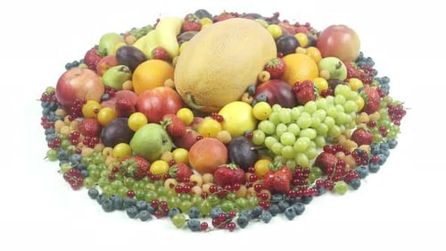 Fresh Assortment of Various Fruits on White Surface