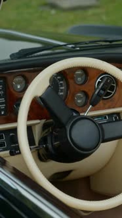 Vintage Car Interior Dashboard and Steering Wheel