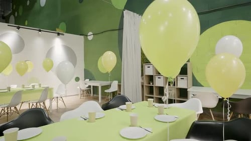 Cheerful and Festive Party Setup Featuring Vibrant Green and Bright Yellow Balloons Galore Creative