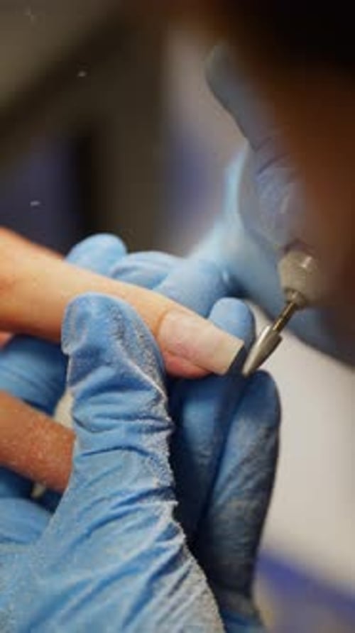 Close Up Nail Treatment with Electric File Tool