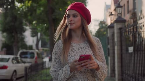 Blonde Female Young Tourist with Phone Traveling in Beautiful City Attractive Caucasian Elegant