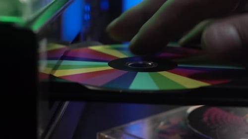 Inserting Compact Disc in CD Player, Close Up