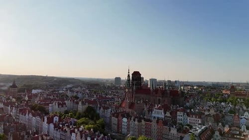 Aerial Video Shot By Drone Over the Historic Tourist Center of Gdansk the City Hall and the