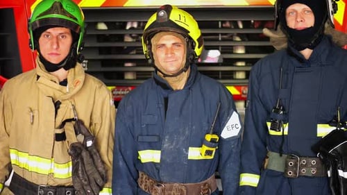 Firefighters in Uniform Protective Gear Ready for Duty