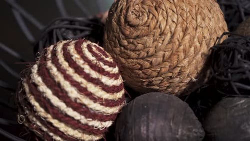 Decorative Spheres in Basket Close Up Dolly Shot