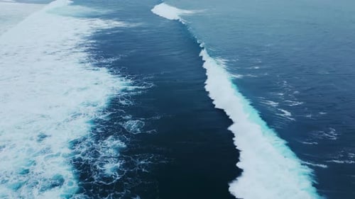 Colorful Travel Above Dramatic Ocean with Big Wave