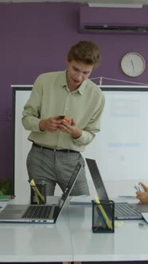 Teacher Conducting Robot Engineering Lesson at School