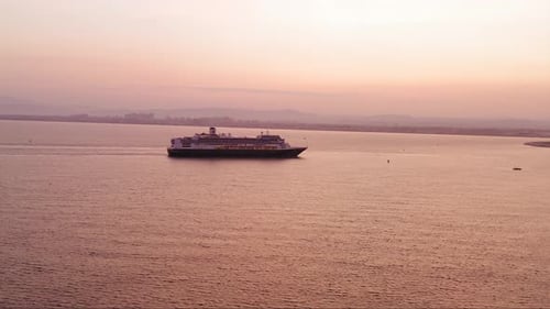 Cruise ship sailing across The Mediterranean Sea at night, Aerial footage.