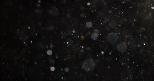 Abstract Dust Particles Drifting with Bokeh Effect