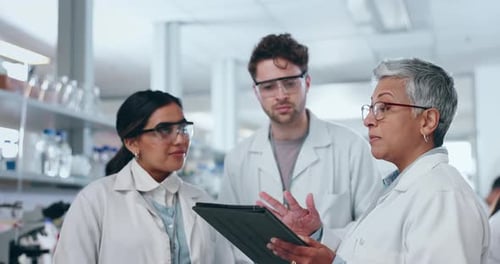 Scientists Collaborate in Modern Medical Laboratory