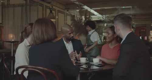 Businesspeople having a Meeting in a Restaurant