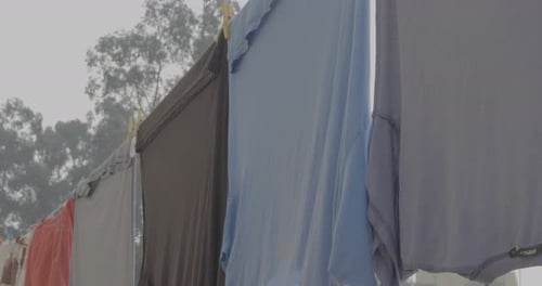 Laundry Hangs and Flutters on a Clothesline