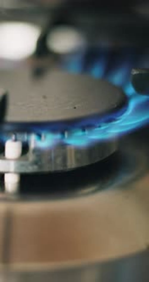 Gas, stove and cooking in kitchen, blue flame and prepare for healthy meal