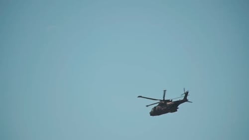 A Military Helicopter in the Sky with a Rescue Service Mission Took Off Over the Airfield