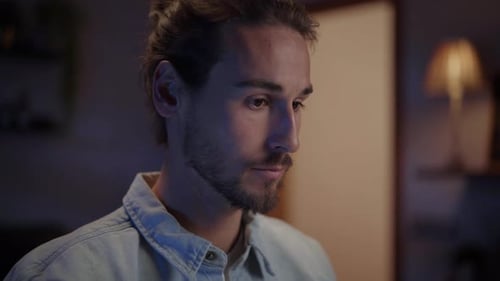Close Up Young Adult Caucasian Handsome Man Working Concentrate From Home Using Device