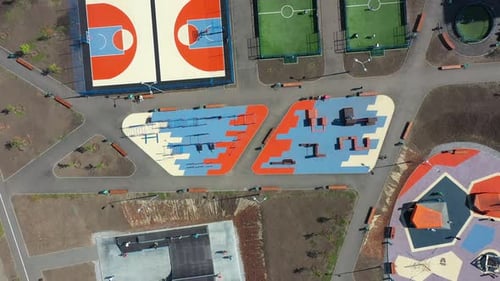 Aerial View on Different Modern Sport Grounds at Urban Park Youth Teenagers and Children Engaging in
