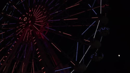Ferris Wheel In Amusement Park On A Dark Night 1