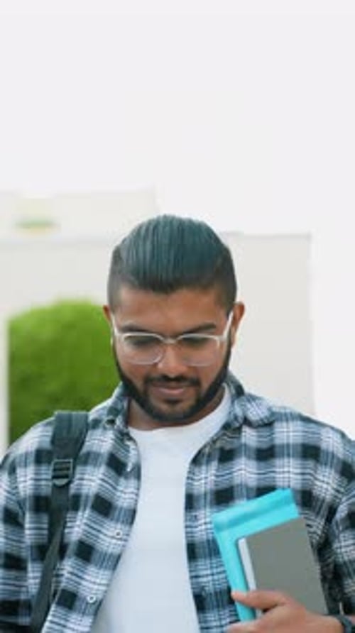Handsome Indian Asian Student Walking After Class in University Campus Vertical Video