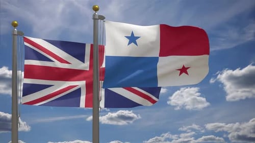 United Kingdom and Panama Flags Waving in Wind Against Blue Sky