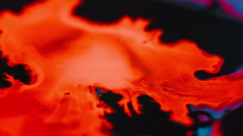 Abstract Colorful Ink Swirls on Black Background