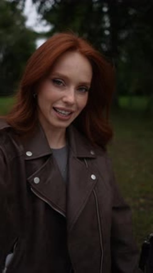Stylish Redhead Vlogging in the Park