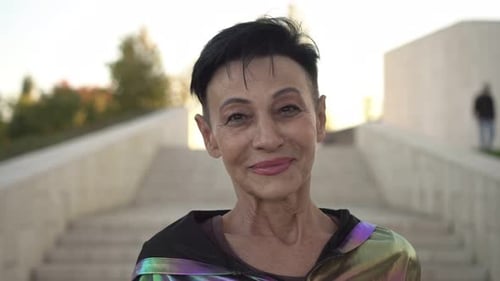 Portrait of an Active Mature Woman in a Park Outdoors